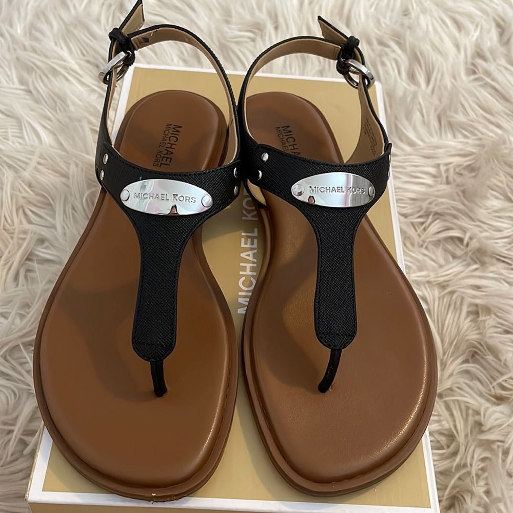 Michael Kors plated thong leather sandals.